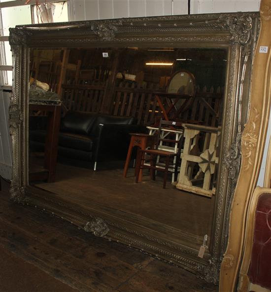 A large silvered composition wall mirror, 7ft 3in. x 5ft 3in.